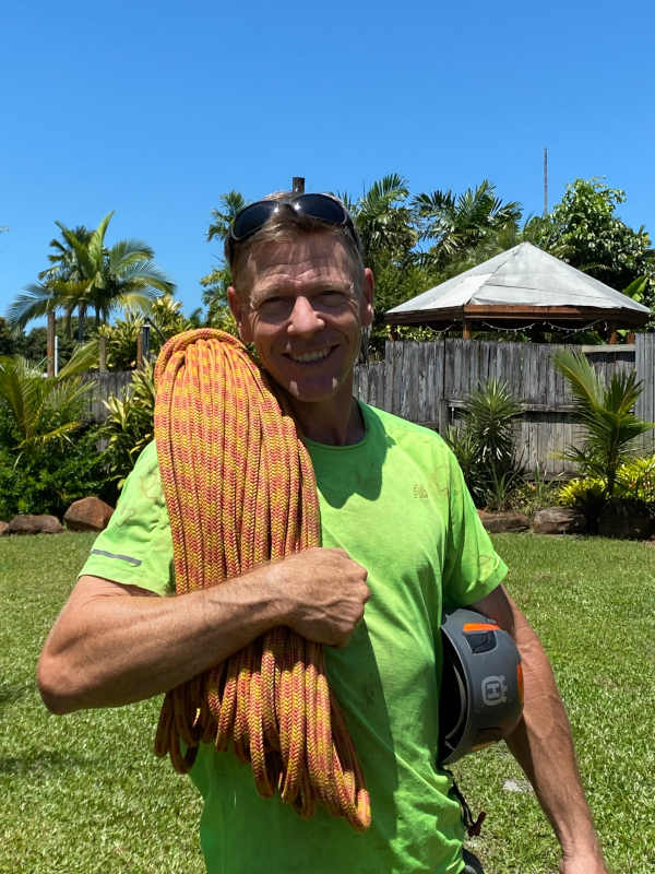 Cairns tree lopping specialst and owner of Synergy Tree Care Cairns, Trent Roulstone holding a tree climbing rope